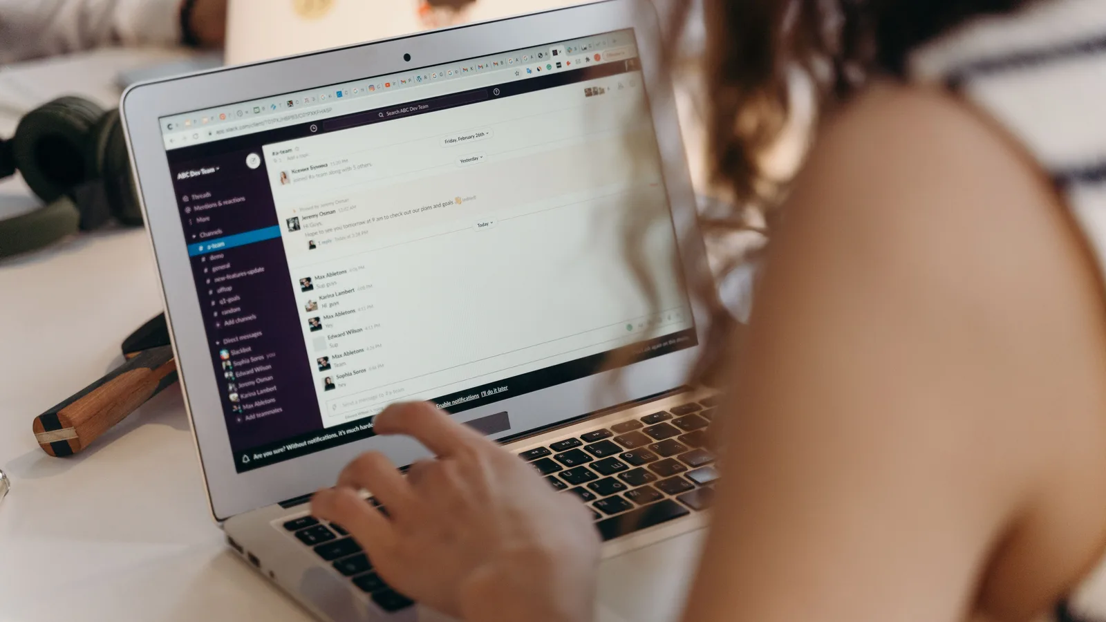 Person using a team messaging application in a browser