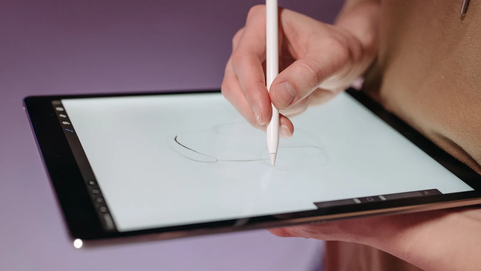Hand drawing with a stylus on a tablet