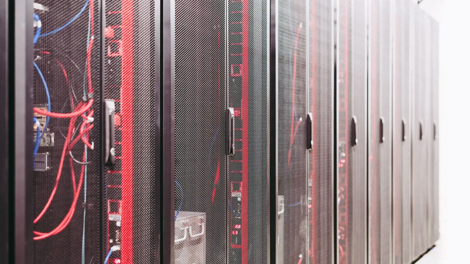 Server cabinets with red network cables