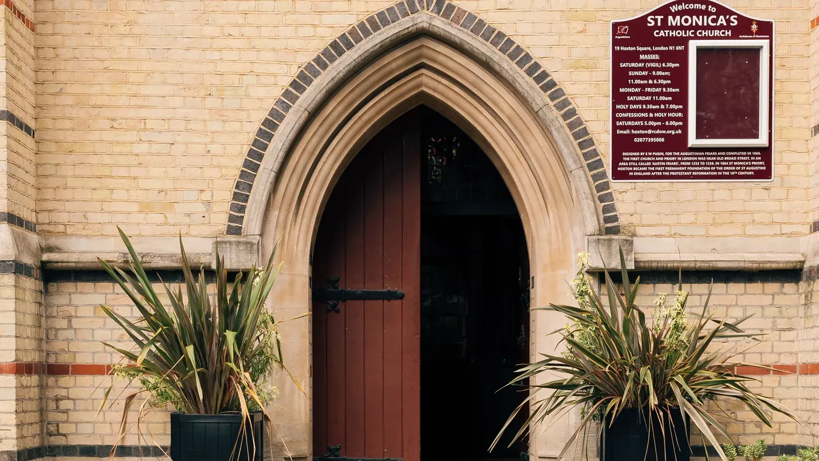 Exterior entrance and sign of a church