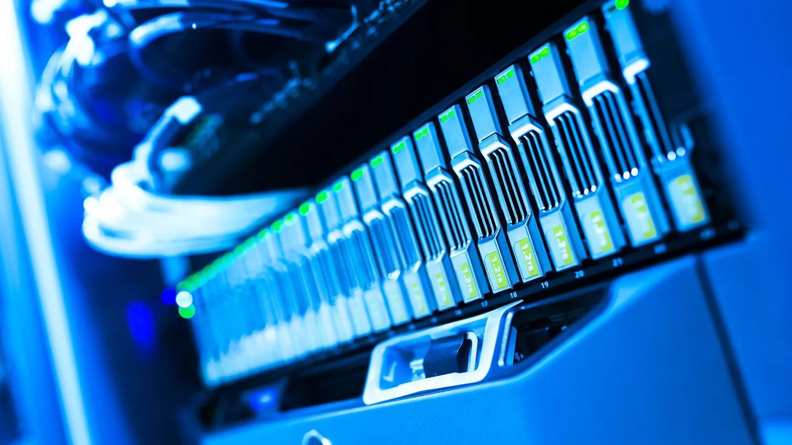 Blue-lit server storage bays