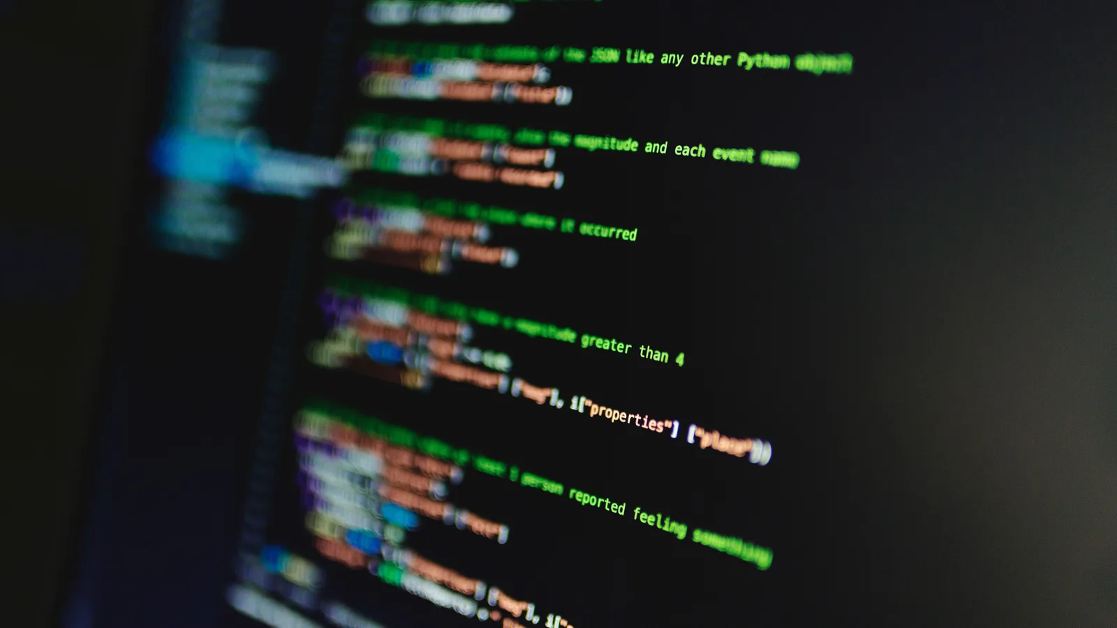 Python-related code photographed on a computer screen