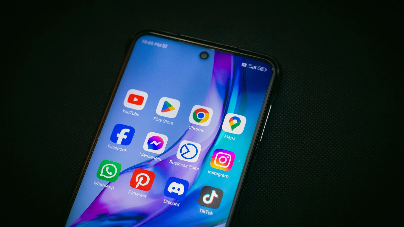 Smartphone displaying social media and messaging app icons