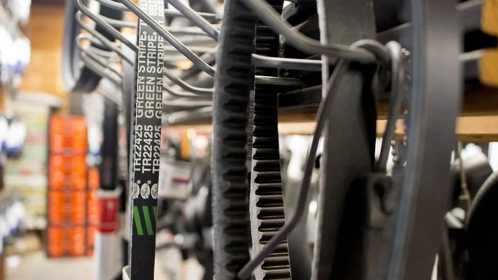 Automotive belts hanging in a parts shop