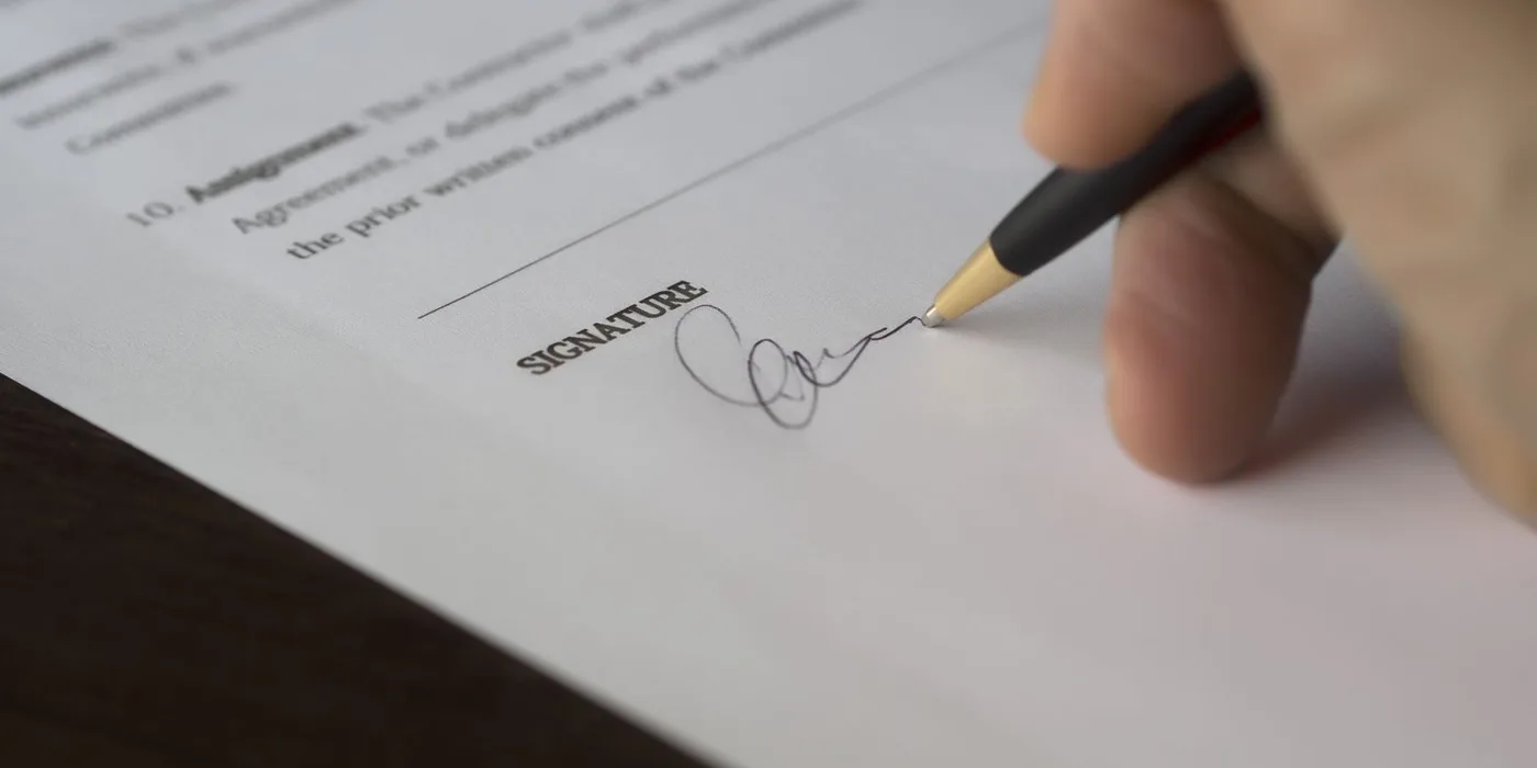 Signing a company registration document